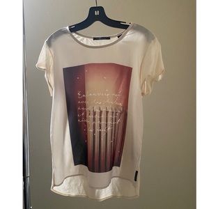 Madison Scotch ivory tee.